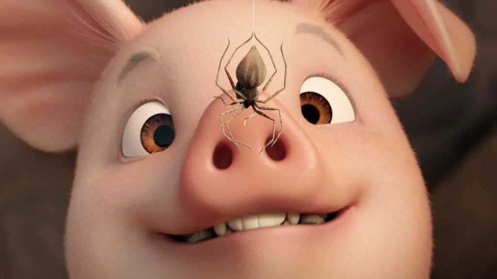 Porquinho Wilbur olha para aranha Charlotte pendurada em sua teia no centro da tela,